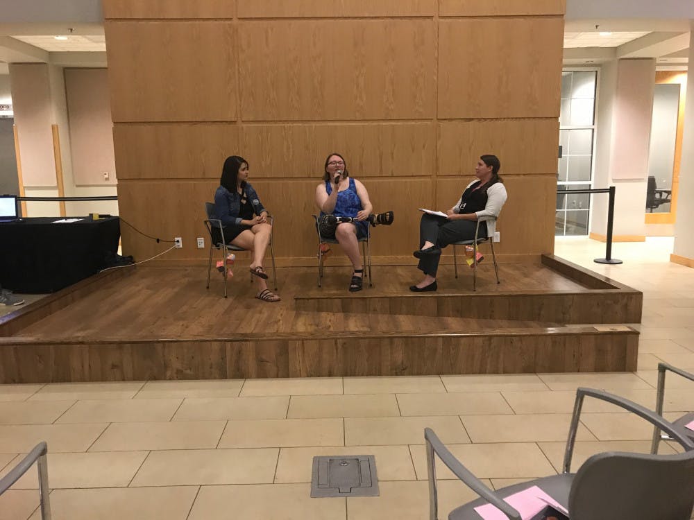 <p>From left: Katie Sloan, 20 and Cheyenne Heflin, 19, share their childhood cancer stories and answer questions from moderator, UF Health clinical social worker Jennifer St. Clair, 37.</p>