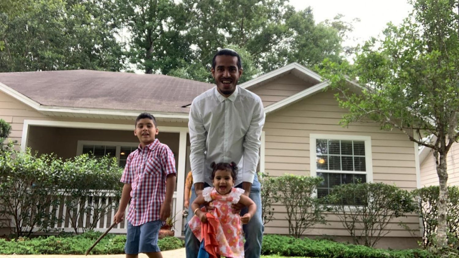 Nawaf Alrogiaee celebrates Eid al-Fitr from his family’s Gainesville home alongside his two children, Ammar, 7, and Alia, 1. 