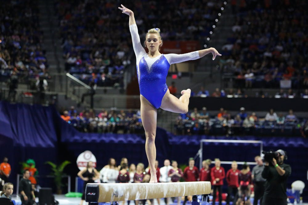 Freshman Alyssa Baumann earned a 9.900 on beam while the Stegeman Coliseum erupted in cheers for a Georgia performer's 10.0 on floor.  “I just tried to tell myself (the cheering) was for me and to stay calm and confident," she said.  