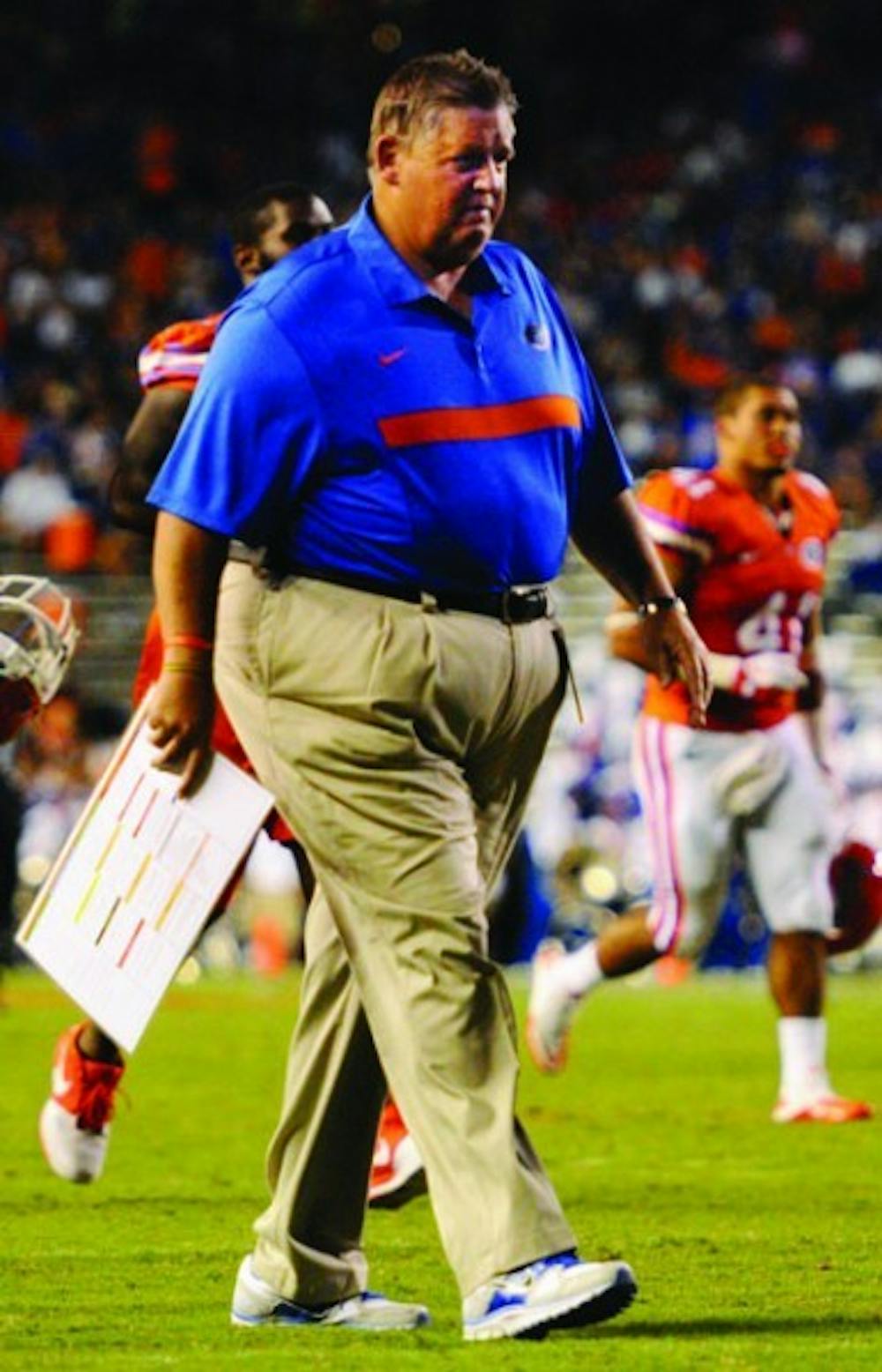 <p>Gators offensive coordinator Charlie Weis is drawing rave reviews from players for his quick play calls and fast-paced tempo.</p>