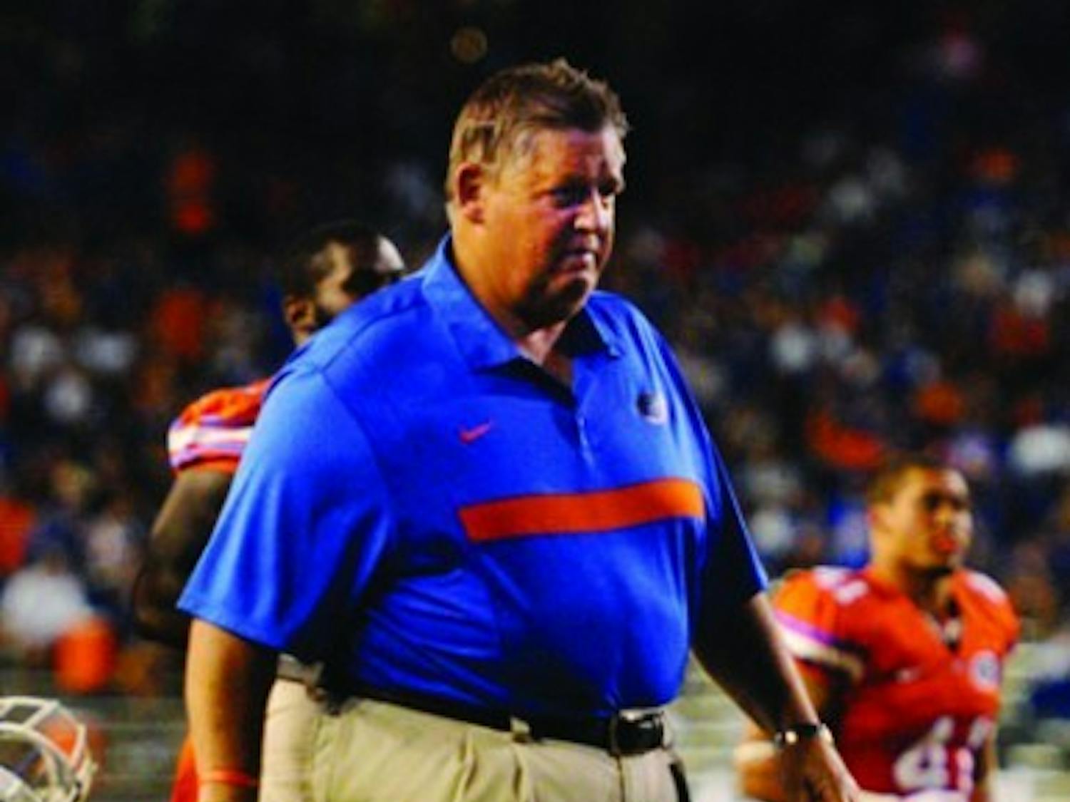 Gators offensive coordinator Charlie Weis is drawing rave reviews from players for his quick play calls and fast-paced tempo.