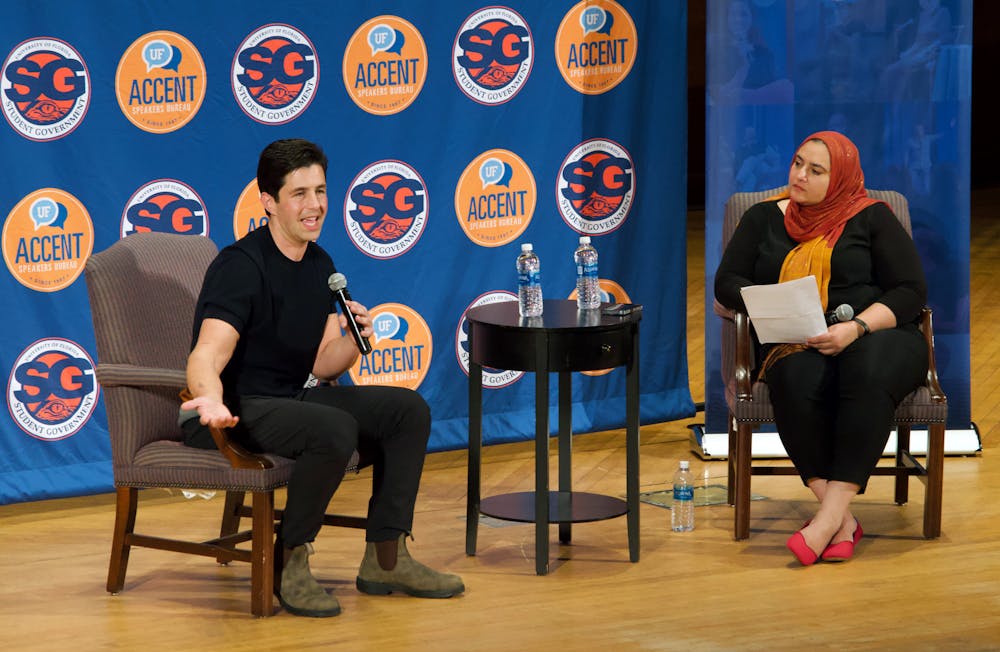 <p>UF Student Government Accent Speaker Josh Peck addresses a crowd of roughly 800 at the University Auditorium Wednesday, Jan. 25, 2023. </p>