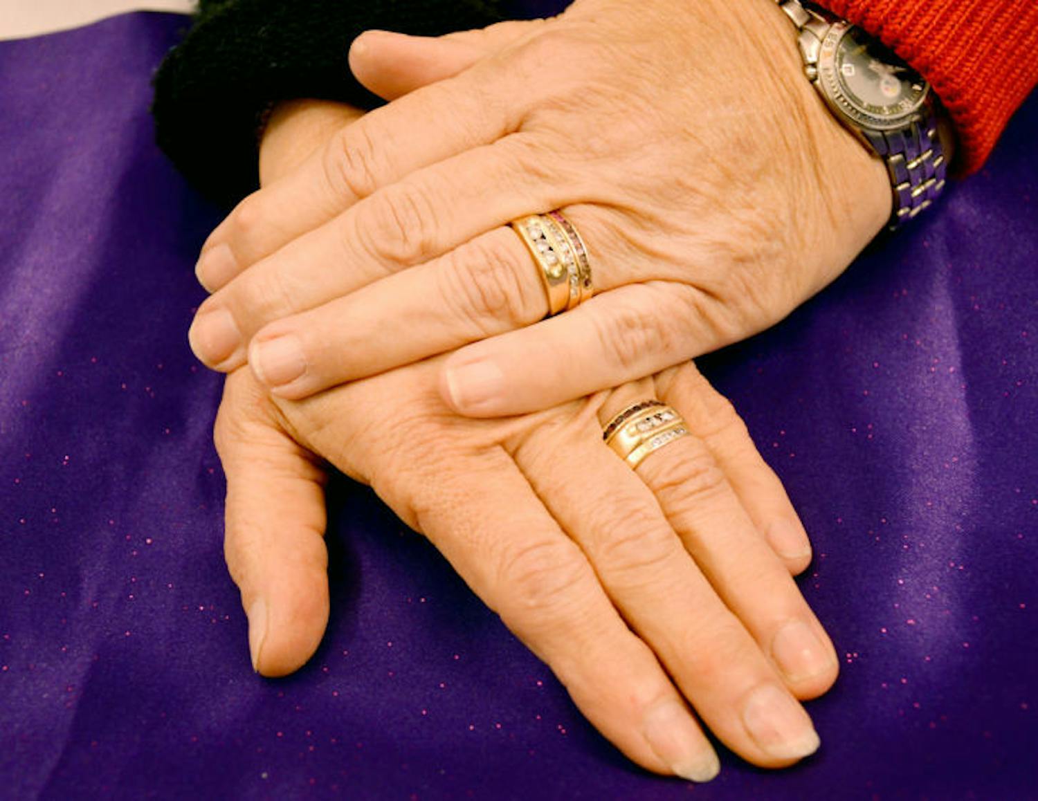 Petersen and Grimes show their rings. They received the holy union in Minnesota in October 1990.