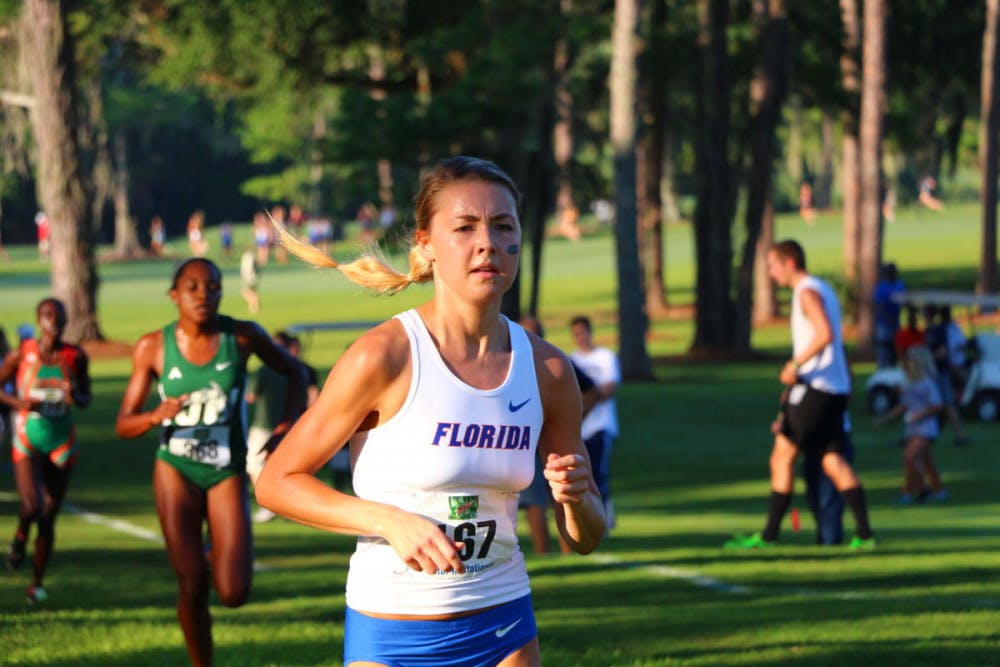 <p><span>Lauren Perry runs during the 2016 Mountain Dew Gator Invitational on Sept. 24, 2016, at Mark Bostick Golf Course.</span></p>