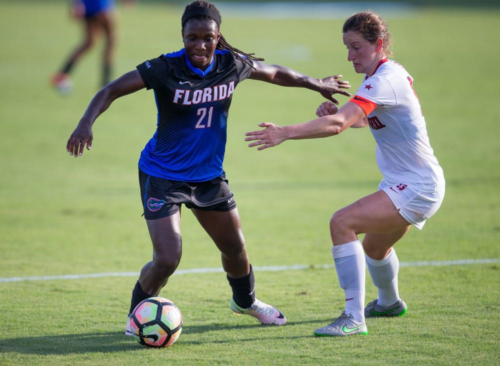 Deanne Rose holds off a defender during Florida's 3-2 win against Stanford on Aug. 25, 2017, at Donald R. Dizney Stadium (photo by Matt Stamey/courtesy of Florida).