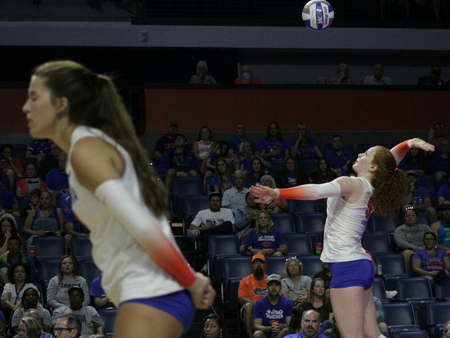 Setter Alexis Stucky serves during a match against Virginia Aug. 27, 2021. 