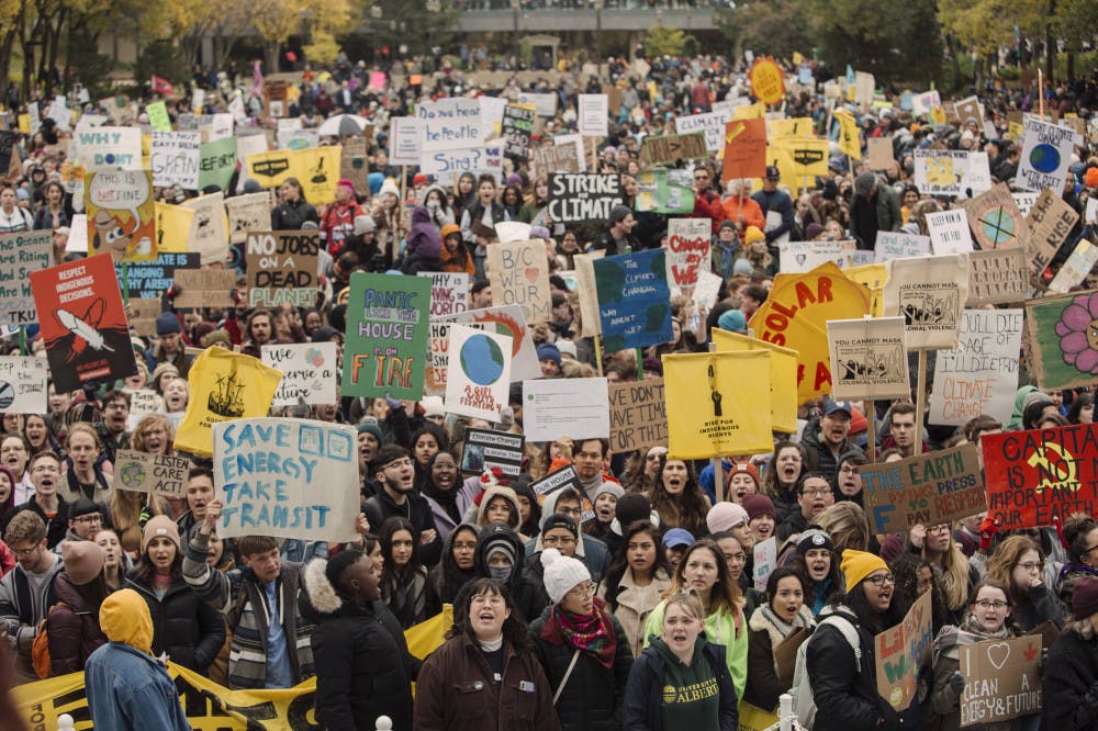<p>Marchers gather for the Climate Strike in Edmonton, Alberta, on Friday, Sept. 27, 2019. (Amber Bracken/The Canadian Press via AP)</p>