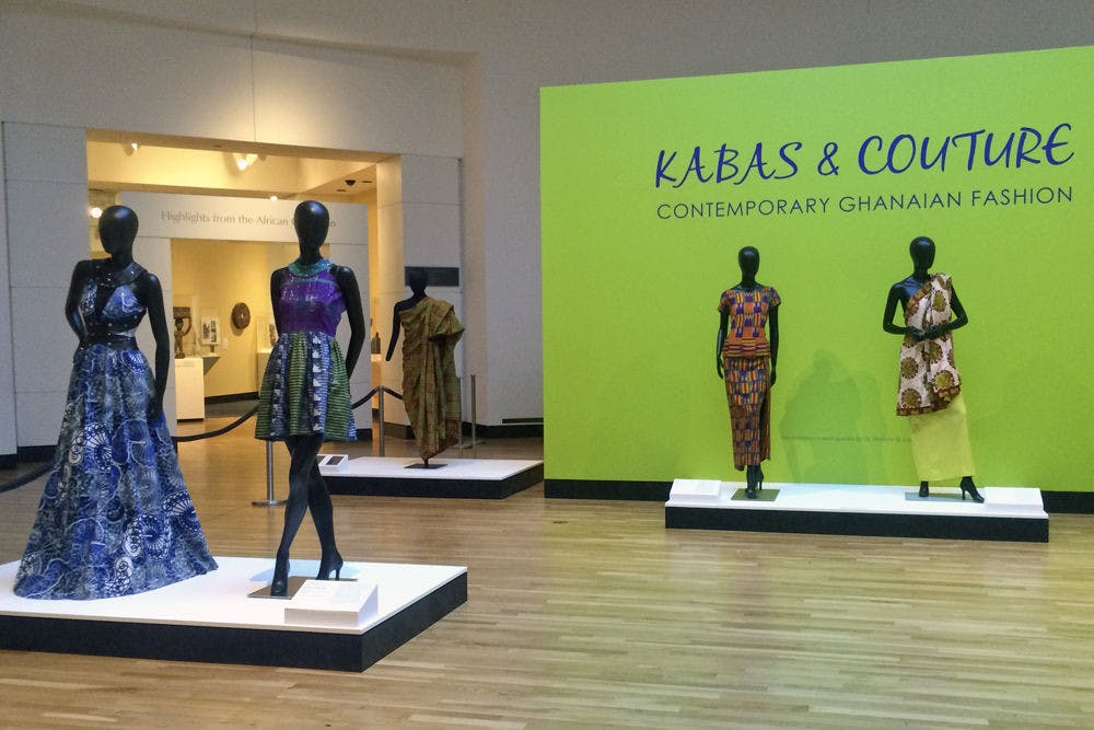Mannequins wearing examples of Ghanaian fashion stand in one of the exhibit rooms in the Harn Museum of Art.