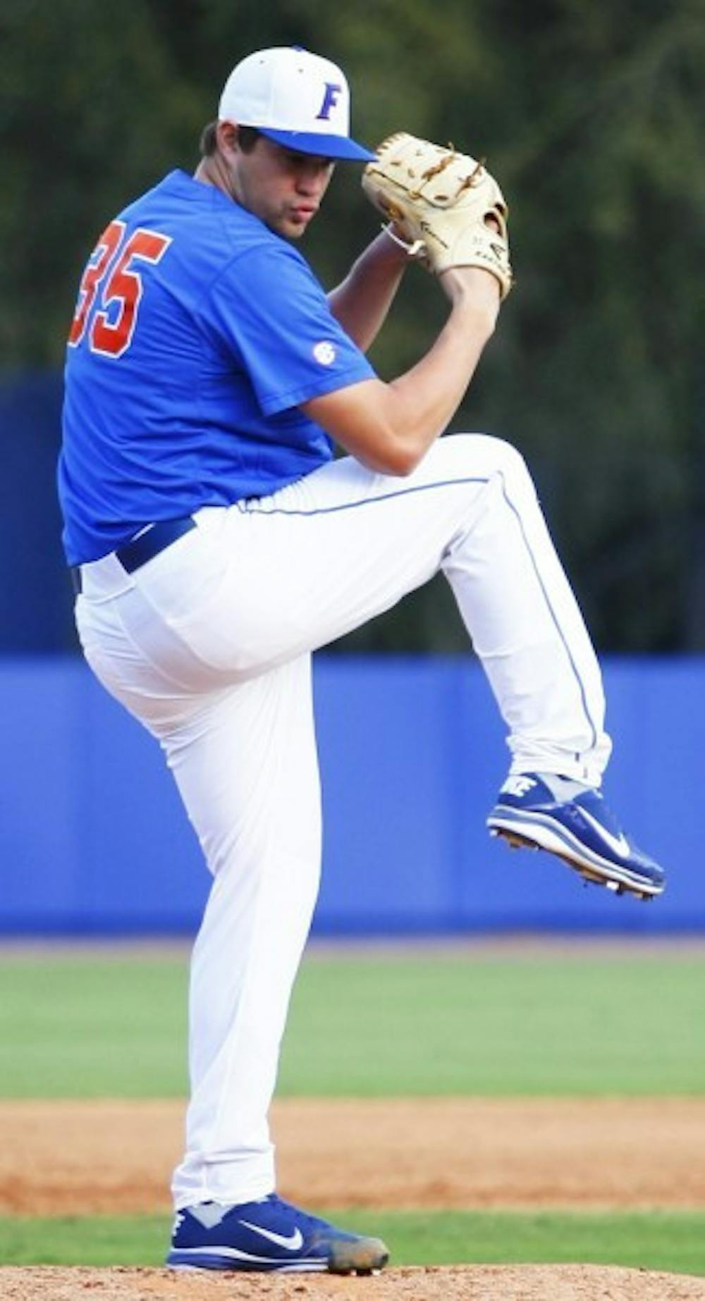 <p>Brian Johnson pitches against Florida Gulf Coast on March 10. He threw his first career complete game against South Carolina on Saturday.&nbsp;</p>