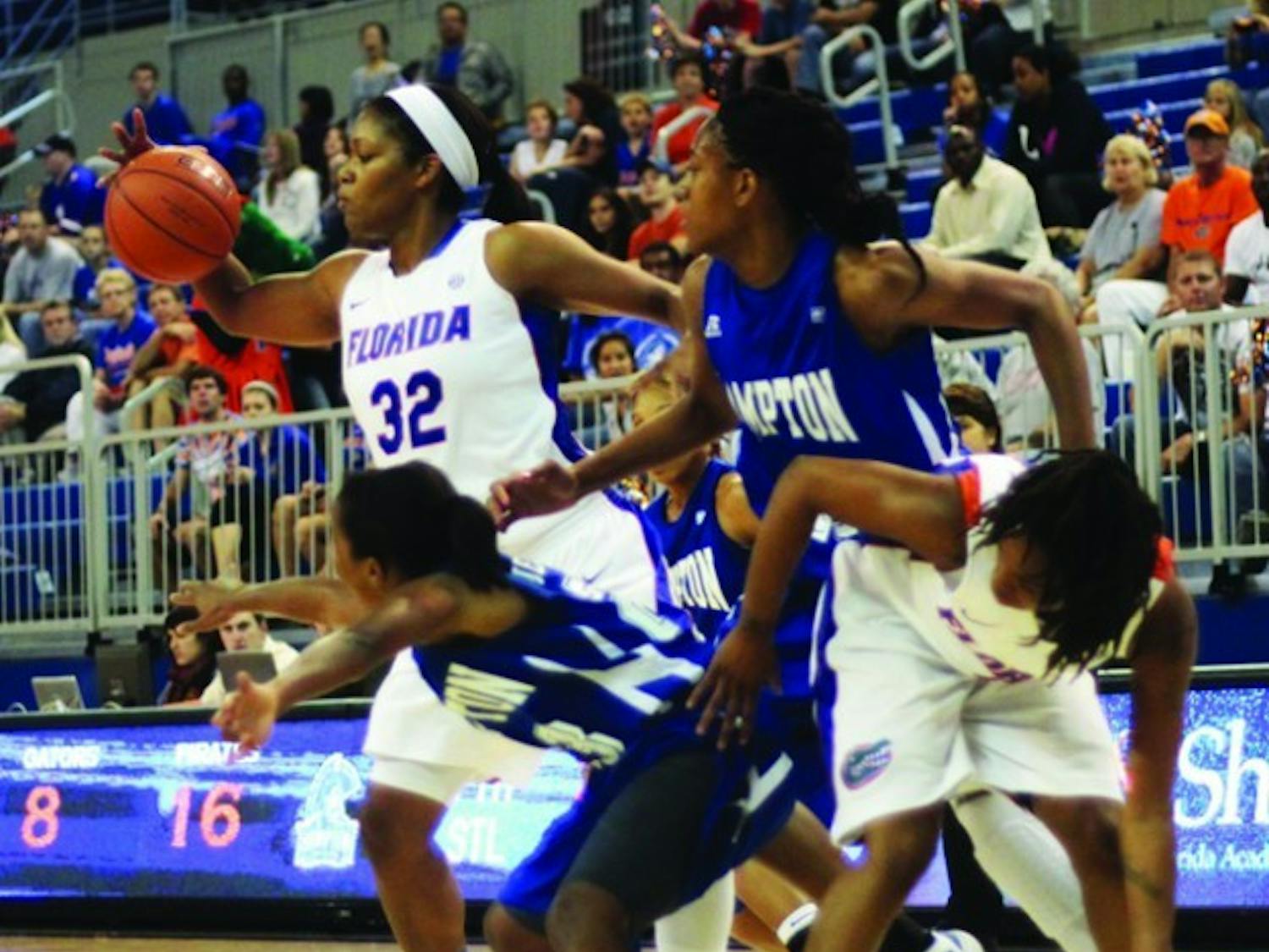 Florida junior forward Jennifer George (32) finished with her fifth career double-double in UF’s 63-46 win against Hampton on Tuesday. George led a dominant post game that helped the Gators erase last year’s loss to the Pirates.