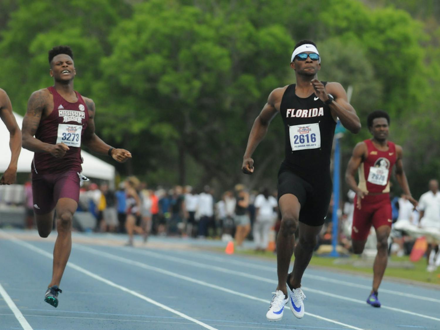 Kunle Fasasi races in the 400-meter dash during the Florida Relays on April 1, 2016, at the Percy Beard Track.