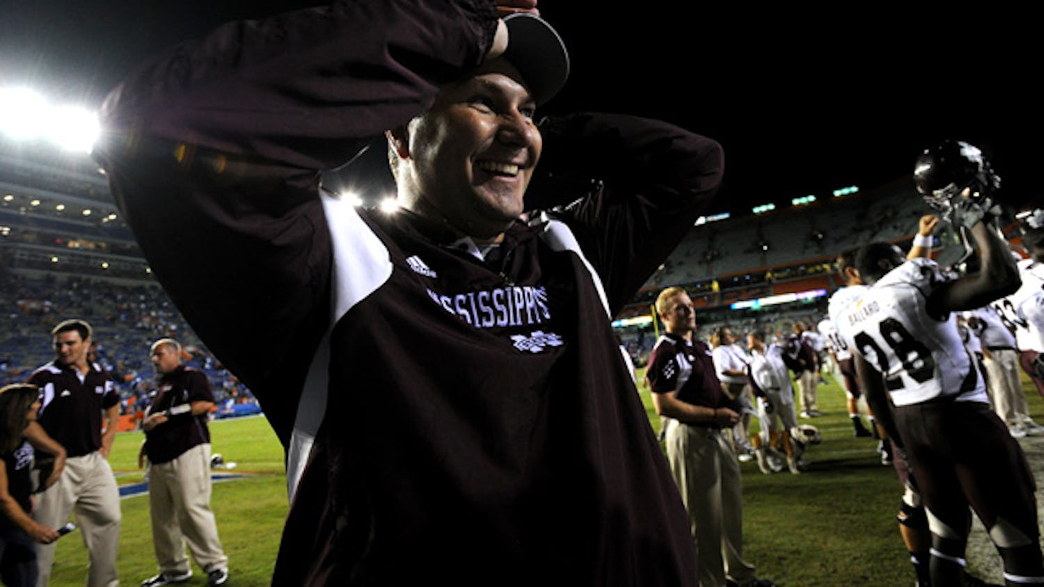 Mississippi State head coach Dan Mullen, who spent four years as UF’s offensive coordinator under Urban Meyer, celebrates on the field after his Bulldogs defeated the Gators 10-7 in 2011.
