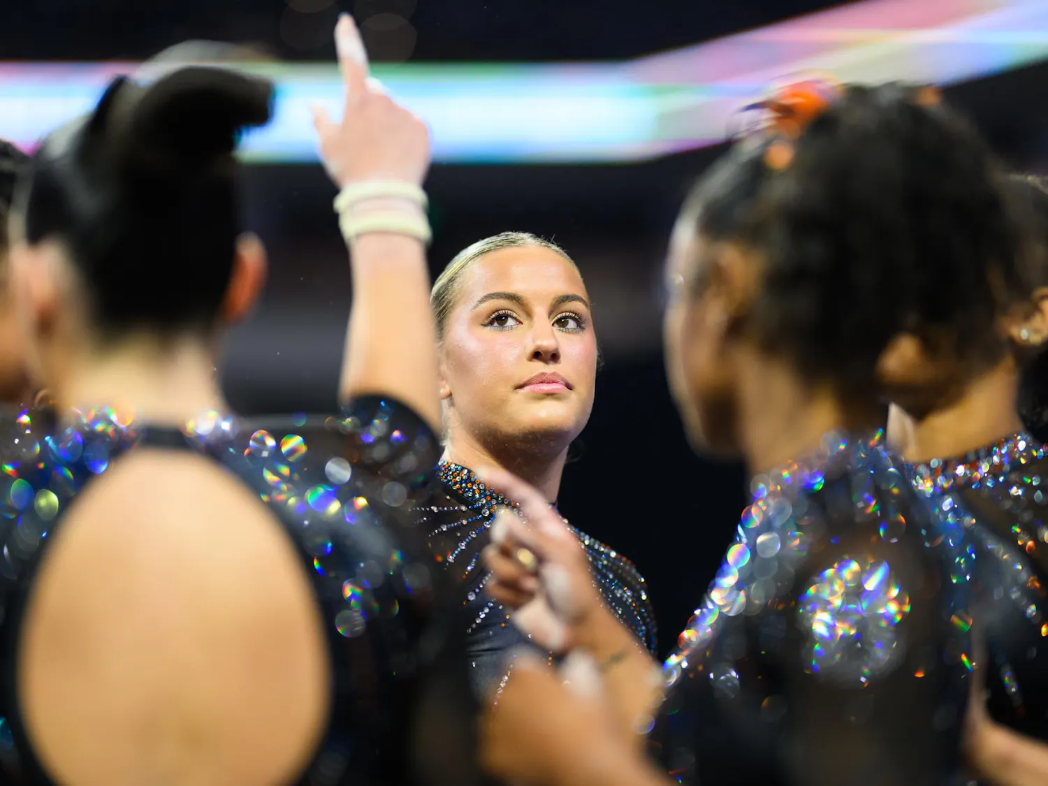 Florida gymnast Skylar Draser leades a team huddle before beam in the NCAA gymnastics National Championship against Oklahoma, LSU and Minnesota, Saturday, April 18, 2026, in Fort Worth, Texas.