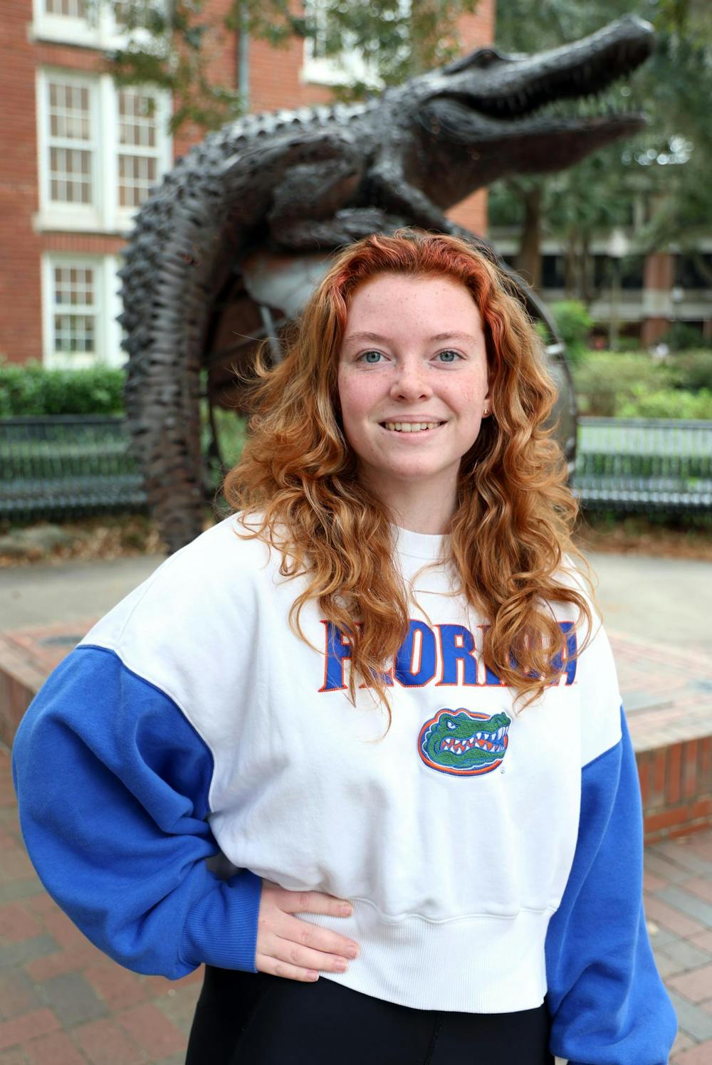 Jane Jones stands in front of the Gator Ubiquity sculpture on the University of Florida campus on Monday, Dec. 1, 2025.