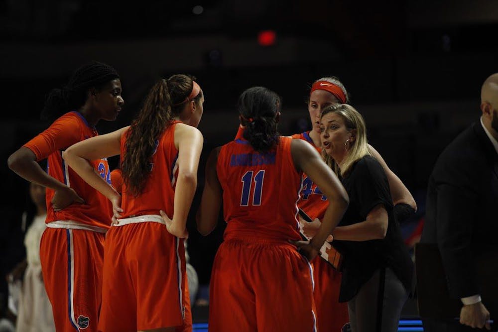 <p>UF head coach Amanda Butler talks to her team during Florida's 84-75 loss to Ole Miss on Feb. 6, 2017, in the O'Connell Center.&nbsp;</p>