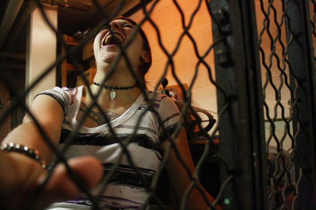 Zoology junior Kristina Wilson, 20, screams as her scalp is being torn off in a makeshift hair trap at the Haunted Broward event Thursday night.