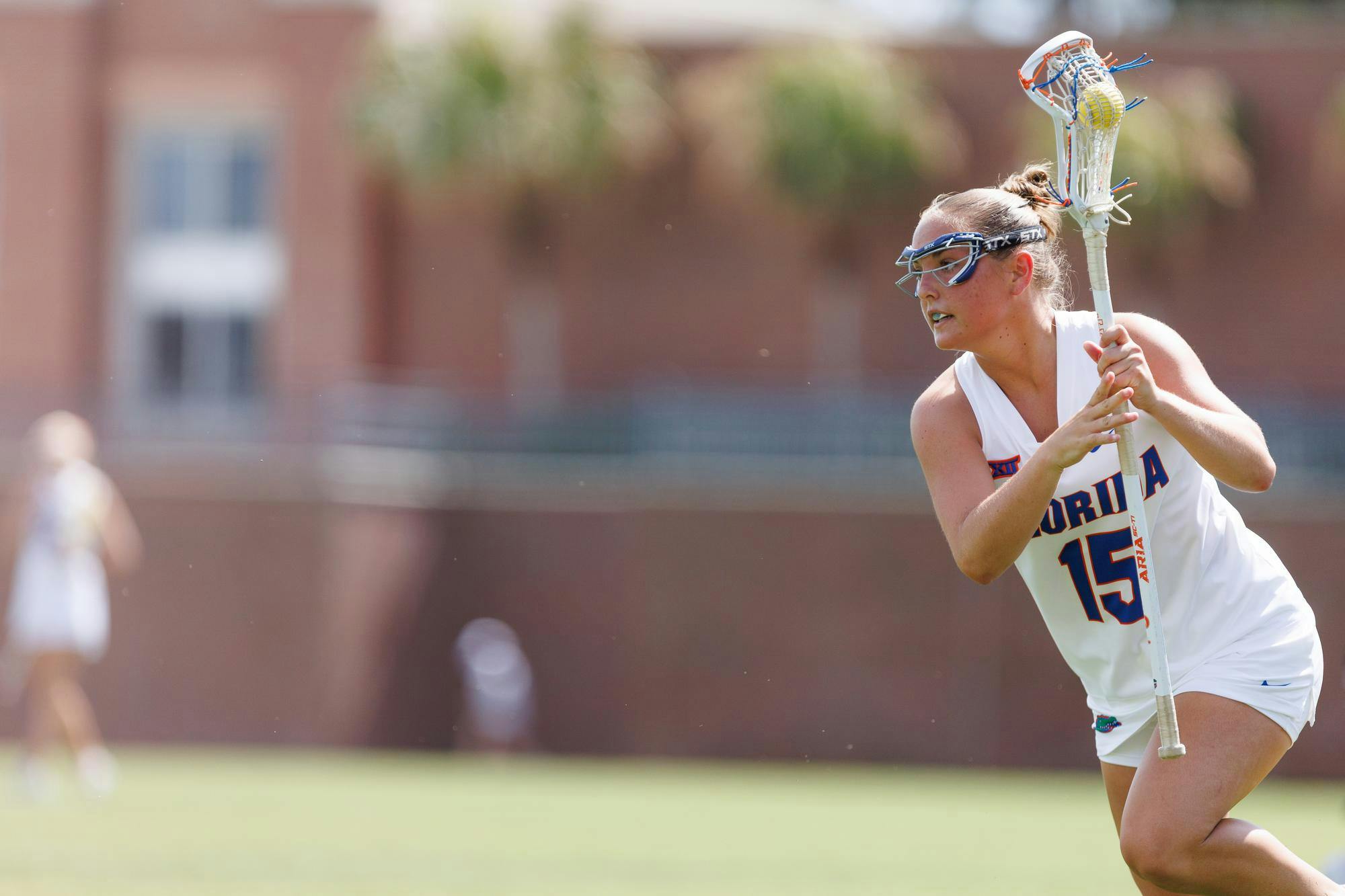 Florida midfielder Caroline Hoskins (15) cradles the ball during the second quarter of an NCAA women’s lacrosse gmae against Mercer, Saturday, March 07, 2026, in Gainesville, Fla.