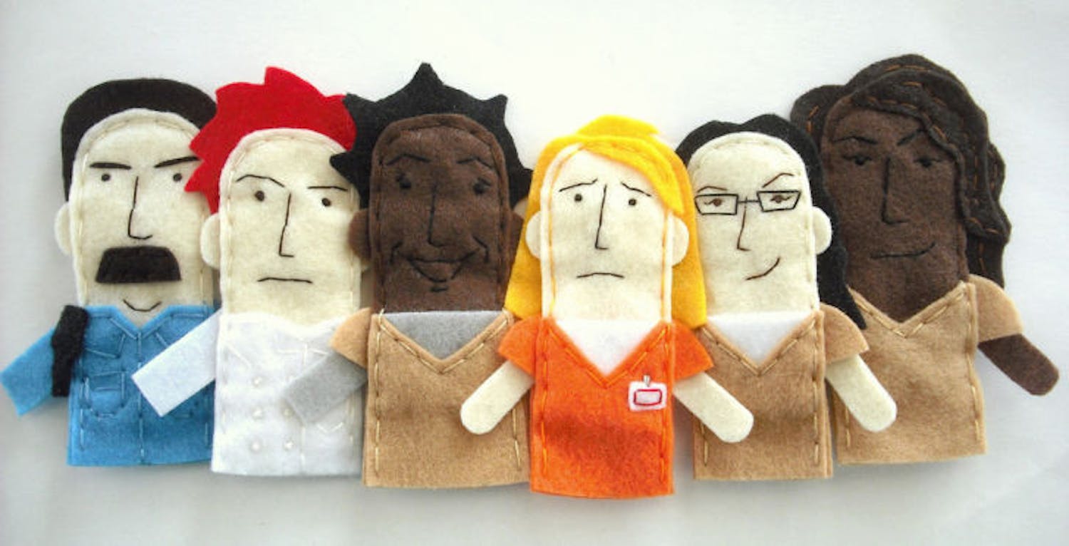 "Orange is the New Black Finger Puppets" by Abbey Hambright, used under CC BY-NC-SA 2.0
