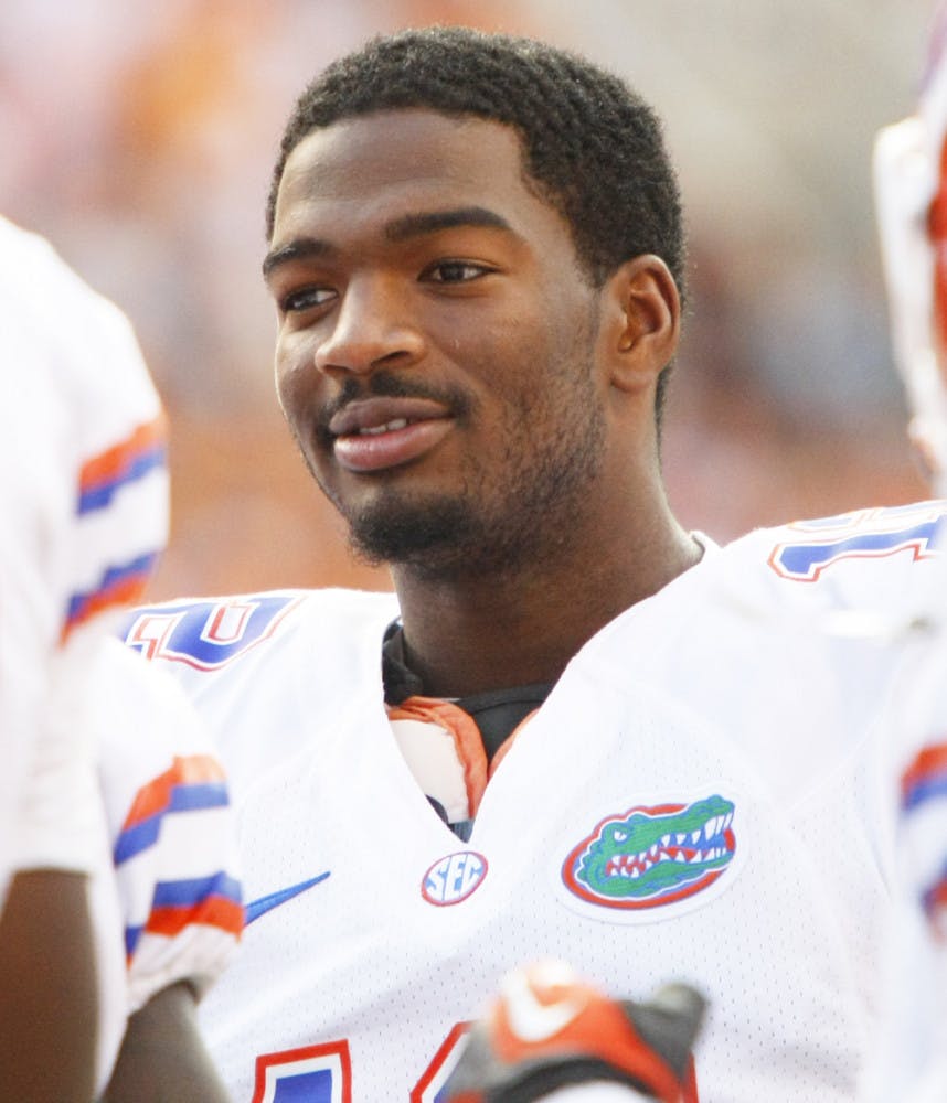 Sophomore quarterback Jacoby Brissett (12) waits on the sidelines during UF's 37-20 victory over Tennessee at Neyland stadium on Saturday.