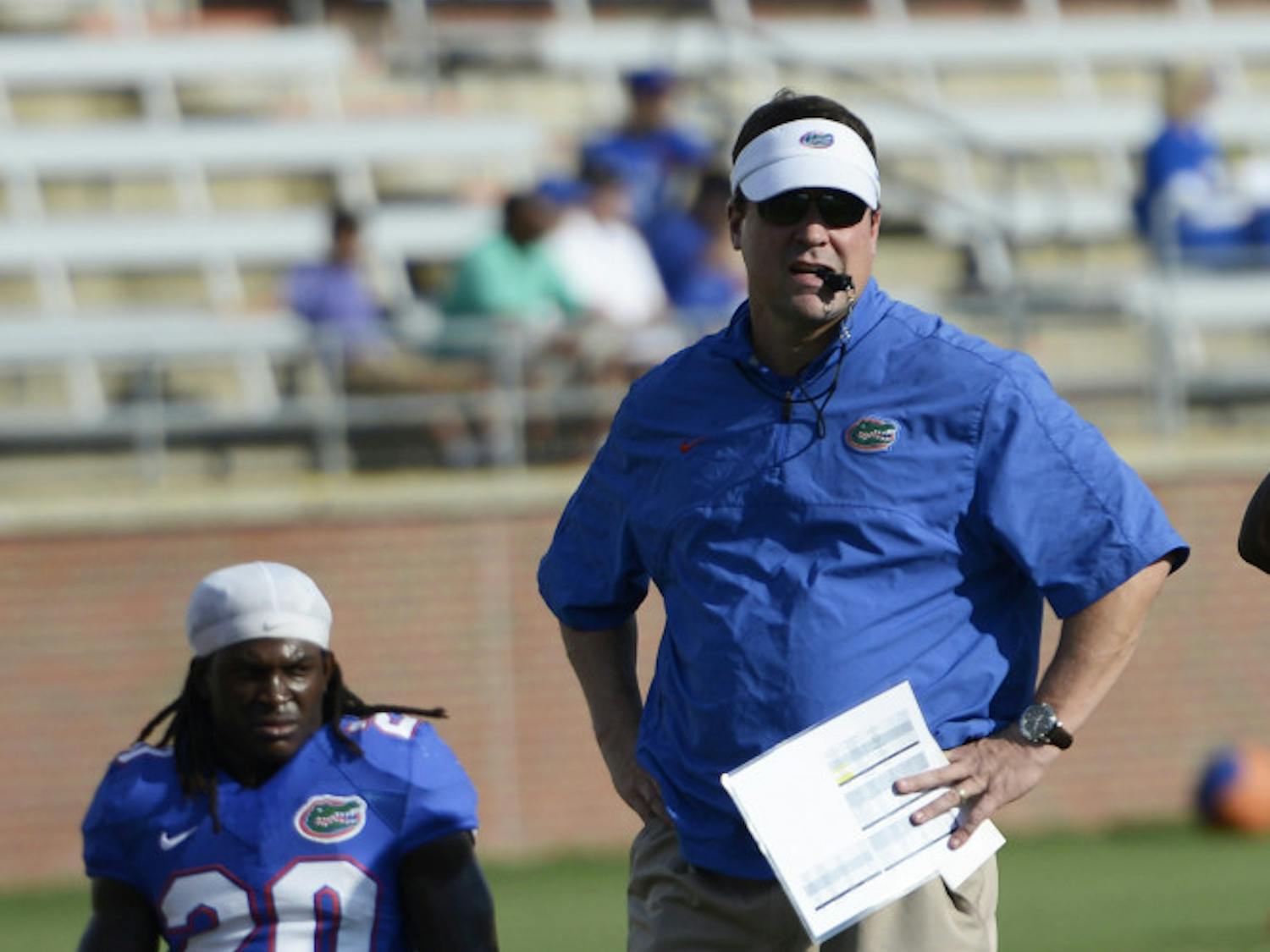Coach Will Muschamp looks on during practice on Aug. 14 at Donald R. Dizney Stadium.