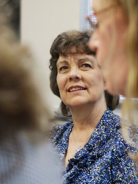 Sue Spencer, 59, practices her lip-reading skills at the Living with Hearing Loss clinic Friday at the United Way of North Central Florida. Spencer was diagnosed with hearing loss last month.