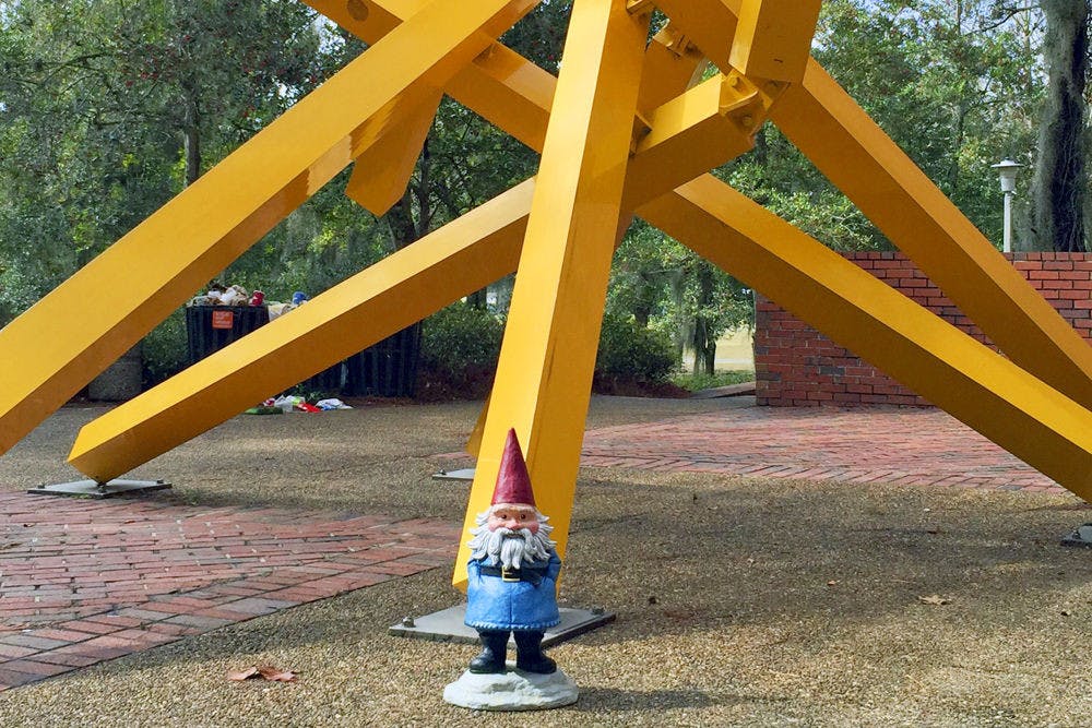 The Roaming Gnome stands in front of the French Fries next to Marston Library around noon. The Gnome is in Gainesville while on tour with ESPN’s College Gameday, which will air from the O’Connell Center on Saturday.