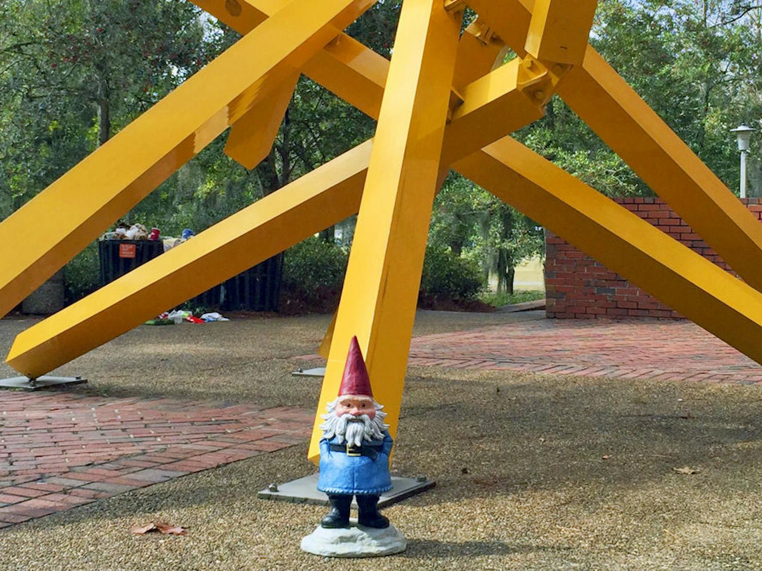 The Roaming Gnome stands in front of the French Fries next to Marston Library around noon. The Gnome is in Gainesville while on tour with ESPN’s College Gameday, which will air from the O’Connell Center on Saturday.