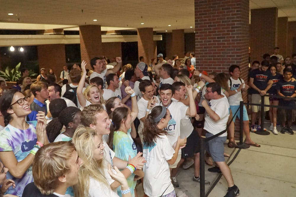 Impact Party candidates and supporters celebrate after winning 34 out of 50 senate seats at the Fall 2015 Senate elections Sept. 30, 2015.
