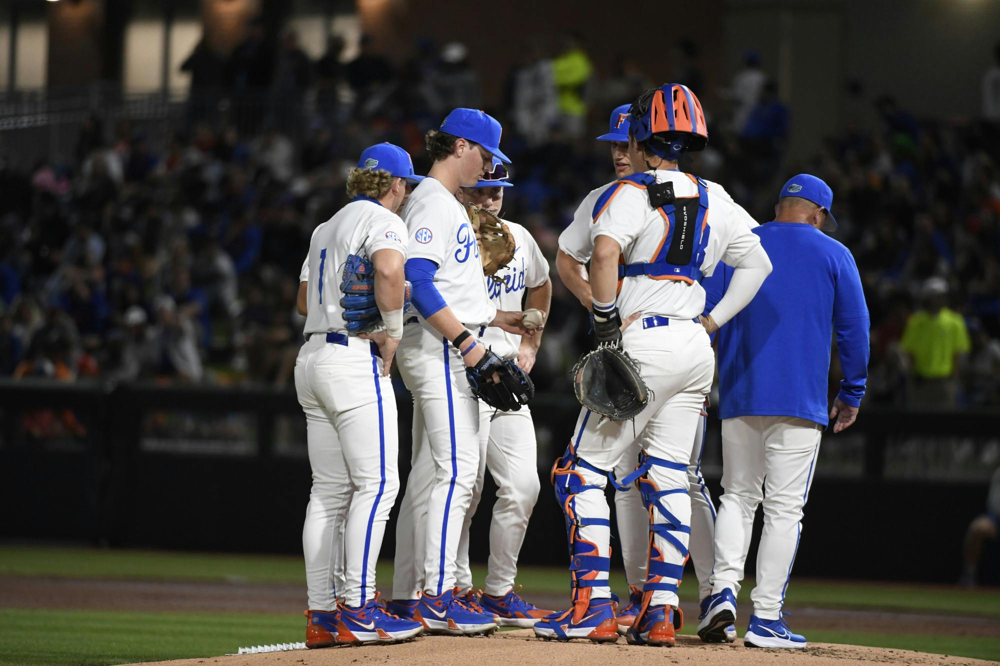 Florida head baseball coach Kevin O'Sullivan exits a mound visit in the baseball team's loss to the St. John's Red Storm on Friday, February 16, 2024. 