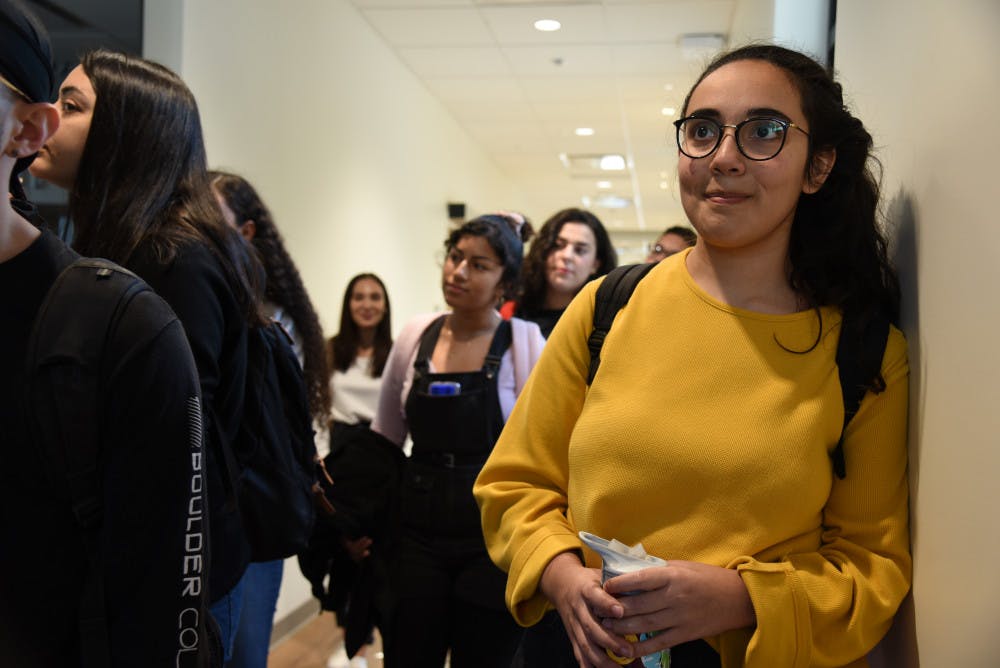 Abby Farah, a 20-year-old nutrition junior, tours the new La Casita space on Wednesday. “I think it is fantastic that the La Casita space is open to us, especially for this class," Farah said. "I think it’s going to be really important for us to appreciate the space that the university has provided and that so many students have worked so incredibly hard for."