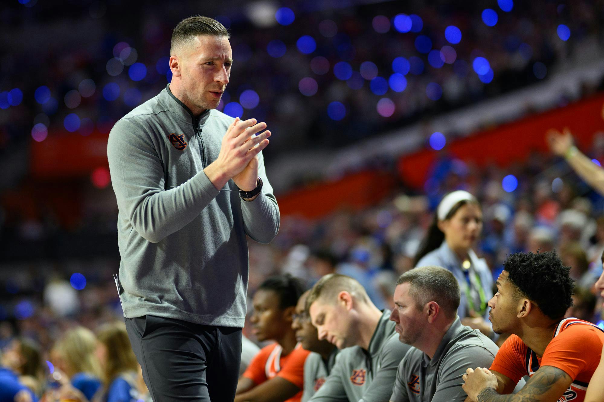 Auburn head coach Steven Pearl encourages his bench during the second half of an NCAA college basketball game against Florida, Saturday, Jan. 24, 2026, in Gainesville, Fla.