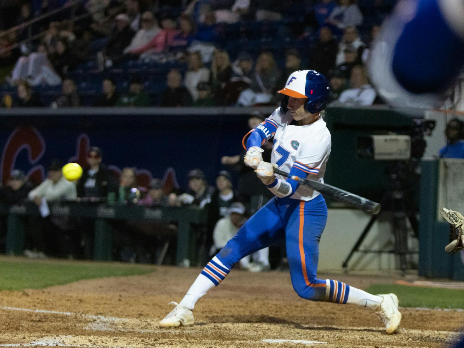 Florida redshirt senior shortstop Skylar Wallace hits an RBI during the Gators' 9-1 win against the Jacksonville Dolphins, Wednesday, Feb. 14, 2024. 