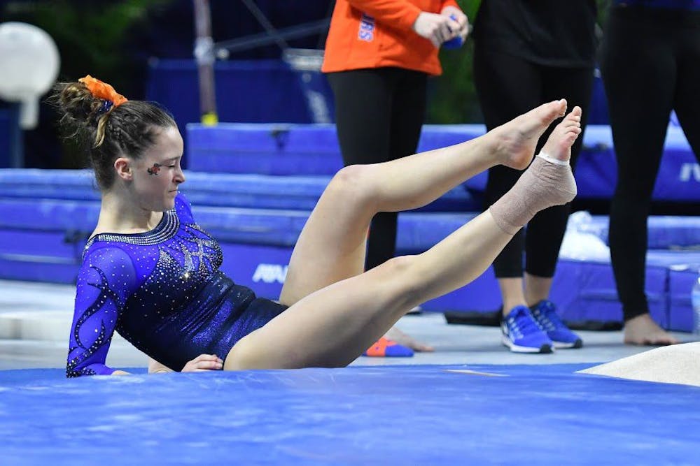 <p>UF's Maegan Chant falls during a routine in Florida's win against Kentucky on Jan. 13, 2017, in the O'Connell Center.</p>