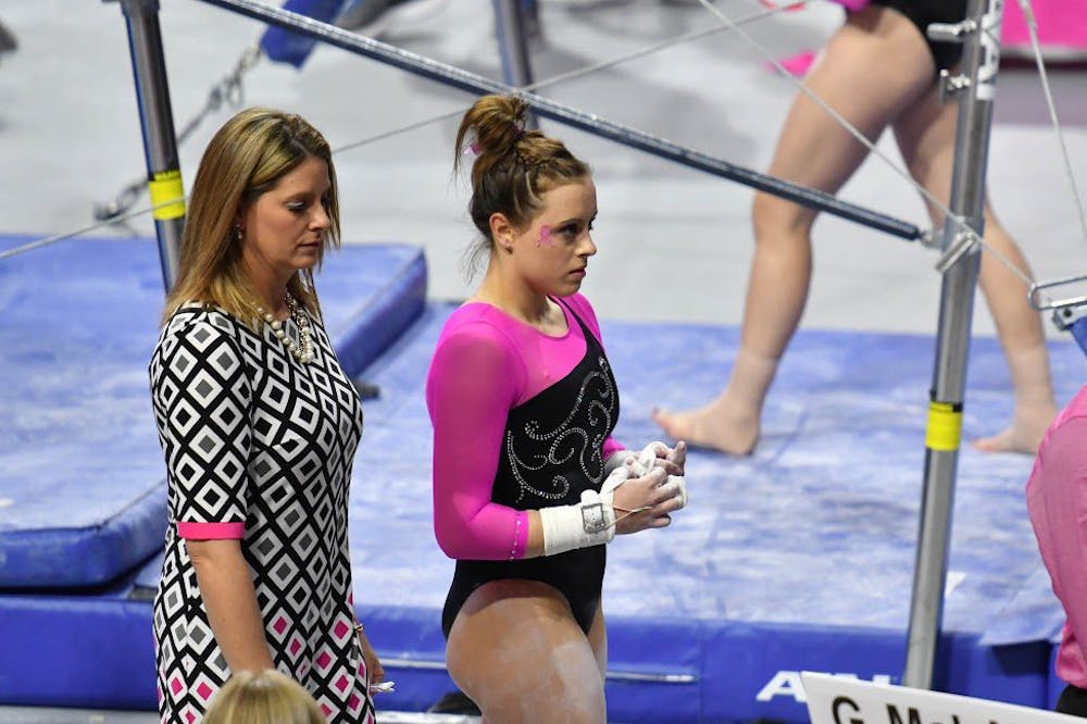 <p>UF gymnast Grace McLaughlin prepares for an event during Florida's win over Auburn on Jan. 27, 2017, in the O'Connell Center.&nbsp;</p>