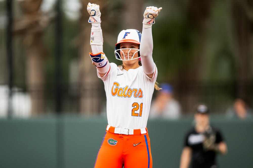 Florida Gators outfielder Taylor Shumaker (21) celebrates towards the dugout in a softball game against Providence in Gainesville, Fla., on Friday, Feb. 14, 2025.