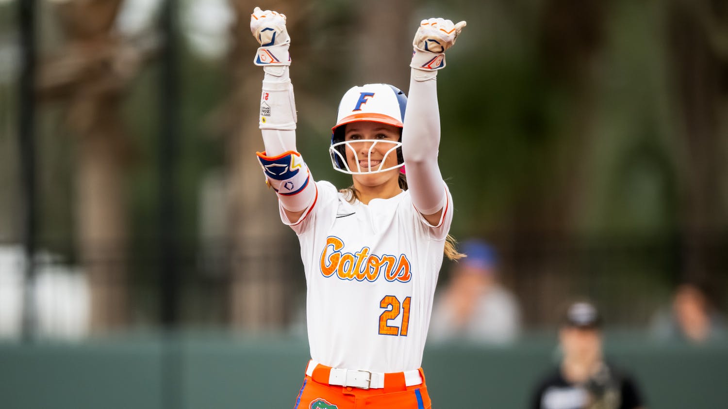 Florida Gators outfielder Taylor Shumaker (21) celebrates towards the dugout in a softball game against Providence in Gainesville, Fla., on Friday, Feb. 14, 2025.