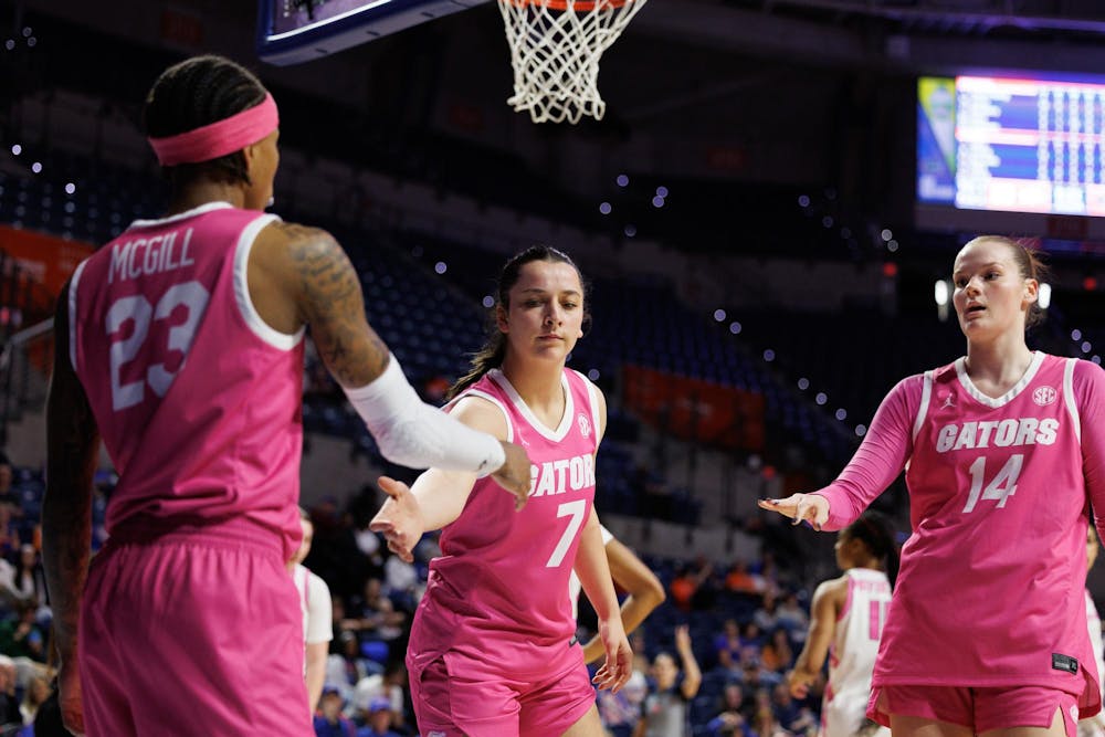 Florida guard Emilija Dakic (7) and Florida center Caterina Piatti (14) during the second half of an NCAA basketball game against Arkansas, Sunday, Feb. 8, 2026, in Gainesville, FL.