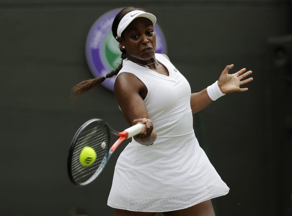 <p>FILE - In this July 6, 2019, file photo, Sloane Stephens returns to Britain's Johanna Konta in a women's singles match at the Wimbledon Tennis Championships in London. Any World TeamTennis player or coach who tests positive for COVID-19 when arriving for the three-week 2020 season will be dropped from the league without pay. The health plan released Tuesday, June 16, 2020, by the WTT for its matches starting July 12 at The Greenbrier in West Virginia also calls for two daily temperature checks for spectators, no ball kids, a chair umpire aided by electronic line-calling instead of line judges, and no high-fives or handshakes between opponents. The rosters announced for the WTT's nine teams include Grand Slam title winners Kim Clijsters, Sloane Stephens, Sofia Kenin and the Bryan brothers. (AP Photo/Ben Curtis, File)</p>