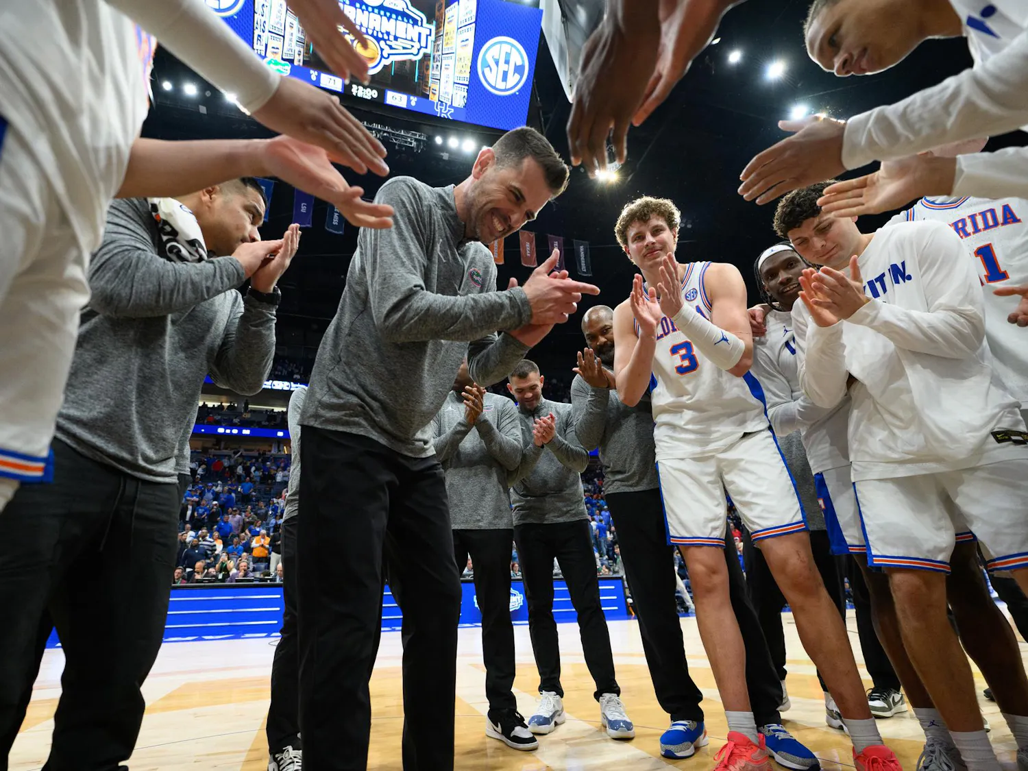 Florida head coach Todd Golden claps out his team after winning an SEC Men's Basketball Tournament quarterfinal game against Kentucky, Friday, March 13, 2026, in Nashville, Tenn.