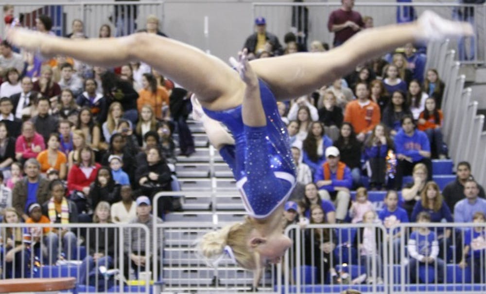 <p>Gators freshman gymnast Rachel Spicer skipped her final semester of high school to enroll in UF at age 17. She posted career bests on beam (9.875) and vault (9.85) Friday against Auburn.</p>