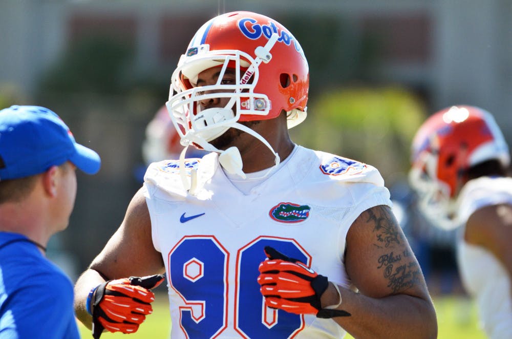 Jon Bullard participates in the Florida football team's first Spring practice of 2015 on Monday at Donald R. Dizney Stadium.