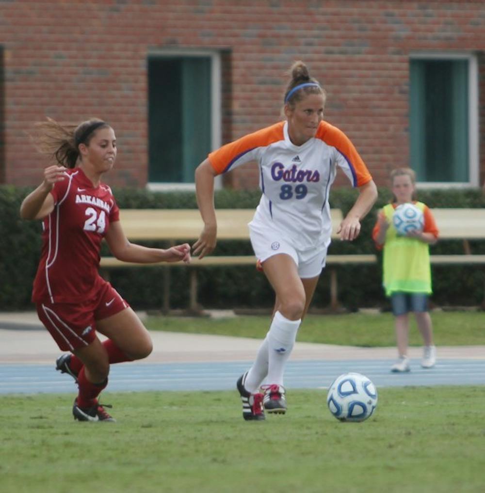 <p>Junior midfielder Caroline Triglia pushes the ball in Florida’s 4-0 win against Arkansas on Sept. 30 at James G. Pressly Stadium.</p>
<div>&nbsp;</div>