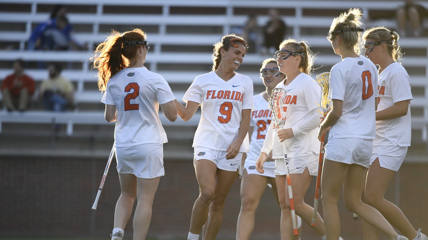 The Florida Gators lacrosse team celebrates its 22-2 win in its exhibition match against the Scotland National Team, Feb. 14, 2024. 