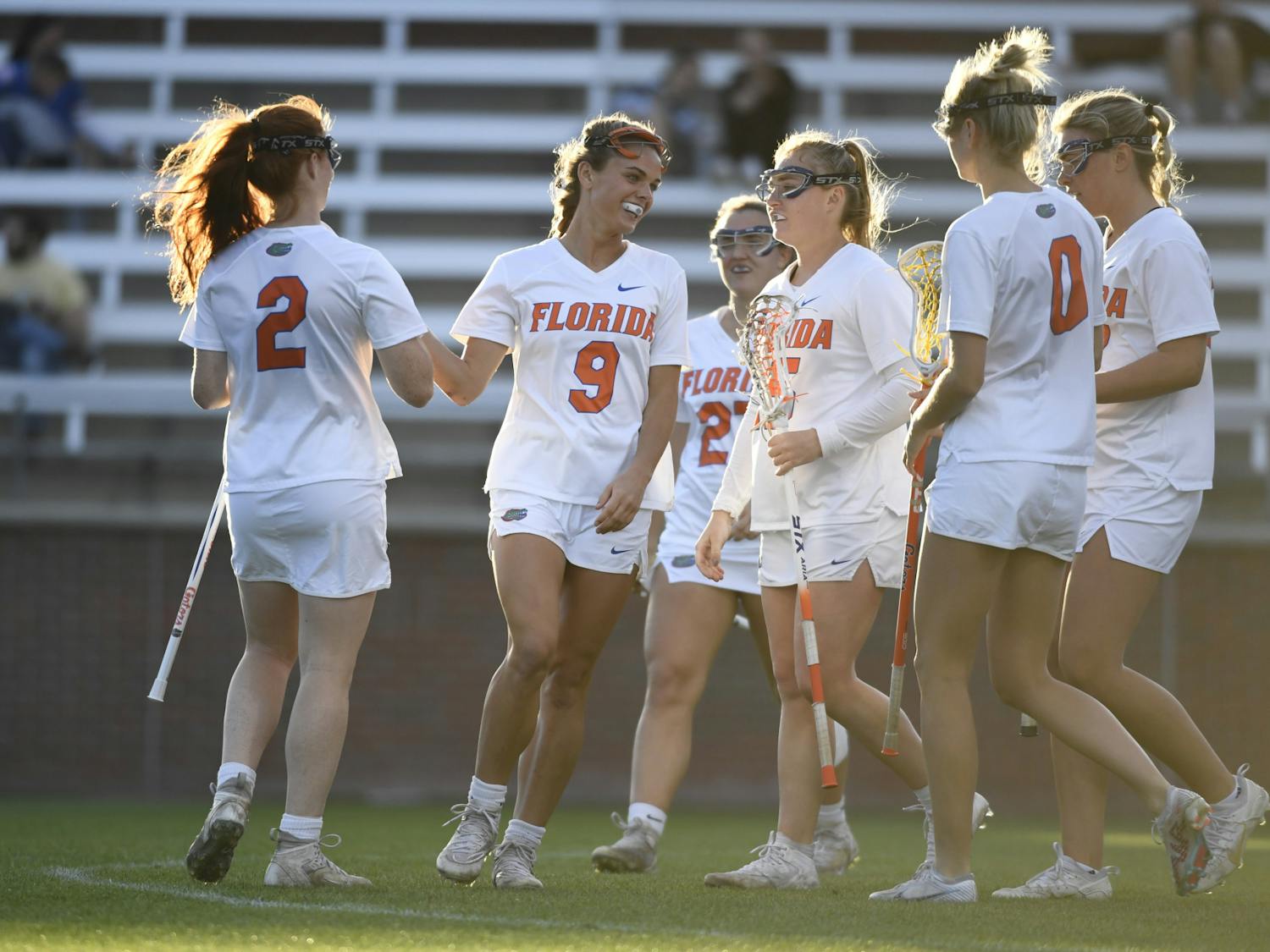 The Florida Gators lacrosse team celebrates its 22-2 win in its exhibition match against the Scotland National Team, Feb. 14, 2024. 
