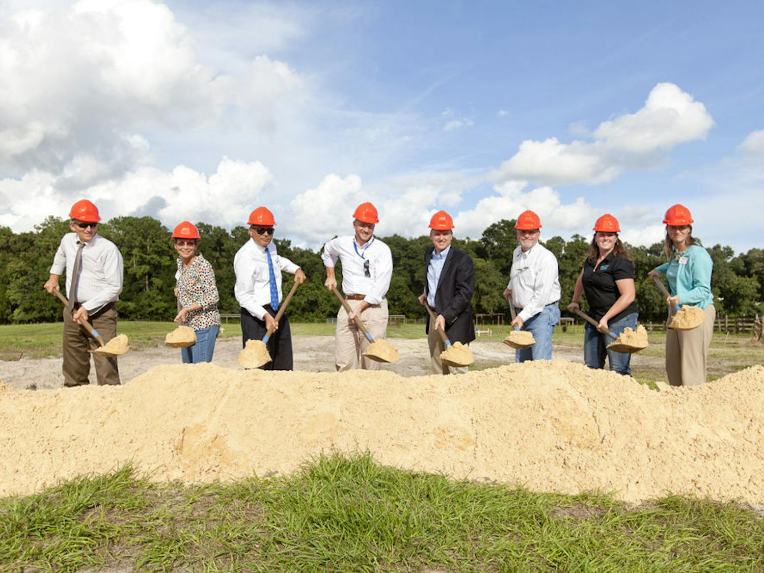 A group of Florida cattlemen and executives break ground for the construction of the UF/IFAS Beef Teaching Unit, 3301 23rd Terrace, on Sept. 10, 2015. The 80-acre farm will house a new cattle processing facility and student housing that will be used by animal science students for research.