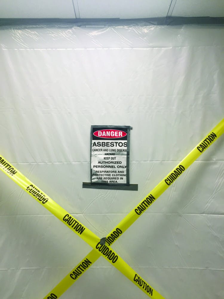 Signs in the Reitz Union warn of asbestos. Parts of the Lower Level of the Reitz Union are closed for renovations.