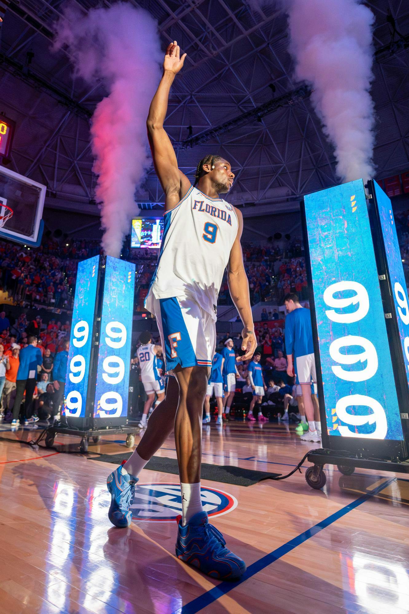 Florida center Rueben Chinyelu (9) walks onto the court before an NCAA college basketball game against Kentucky, Saturday, Feb. 14, 2026 at Exactech Arena in Gainesville, Fla.