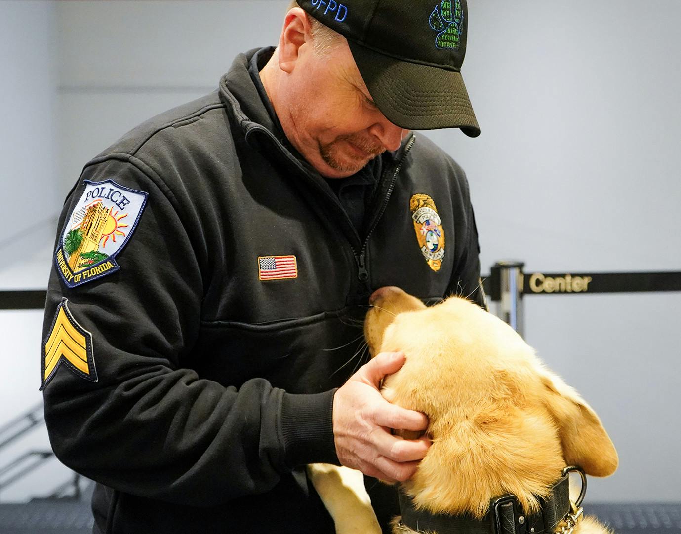 Sgt. Kenny Motes with Beto, his yellow labrador retriever, on Friday, Jan. 24, 2025. 