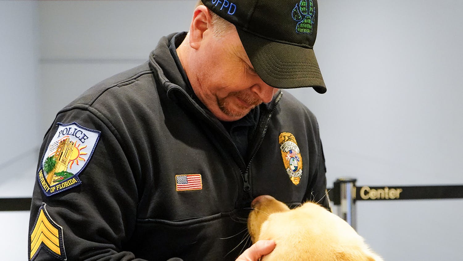 Sgt. Kenny Motes with Beto, his yellow labrador retriever, on Friday, Jan. 24, 2025.