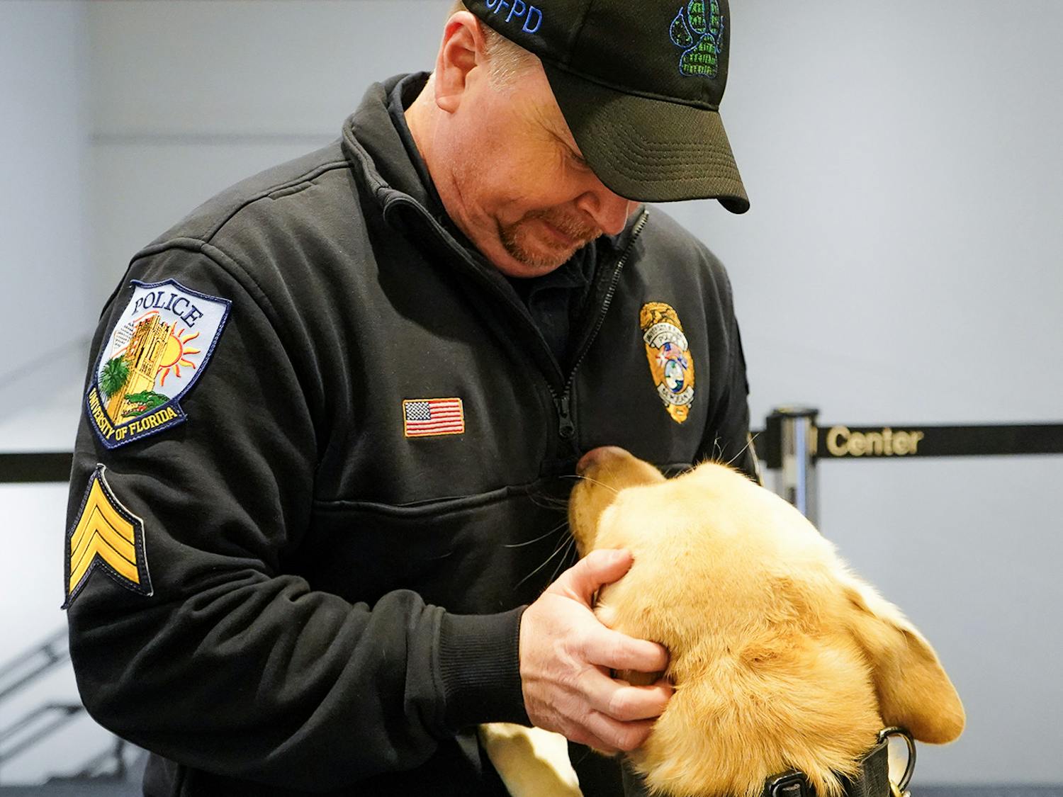Sgt. Kenny Motes with Beto, his yellow labrador retriever, on Friday, Jan. 24, 2025.
